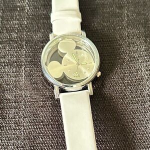 Unbranded Mickey Mouse watch with white band and rhinestone numbers